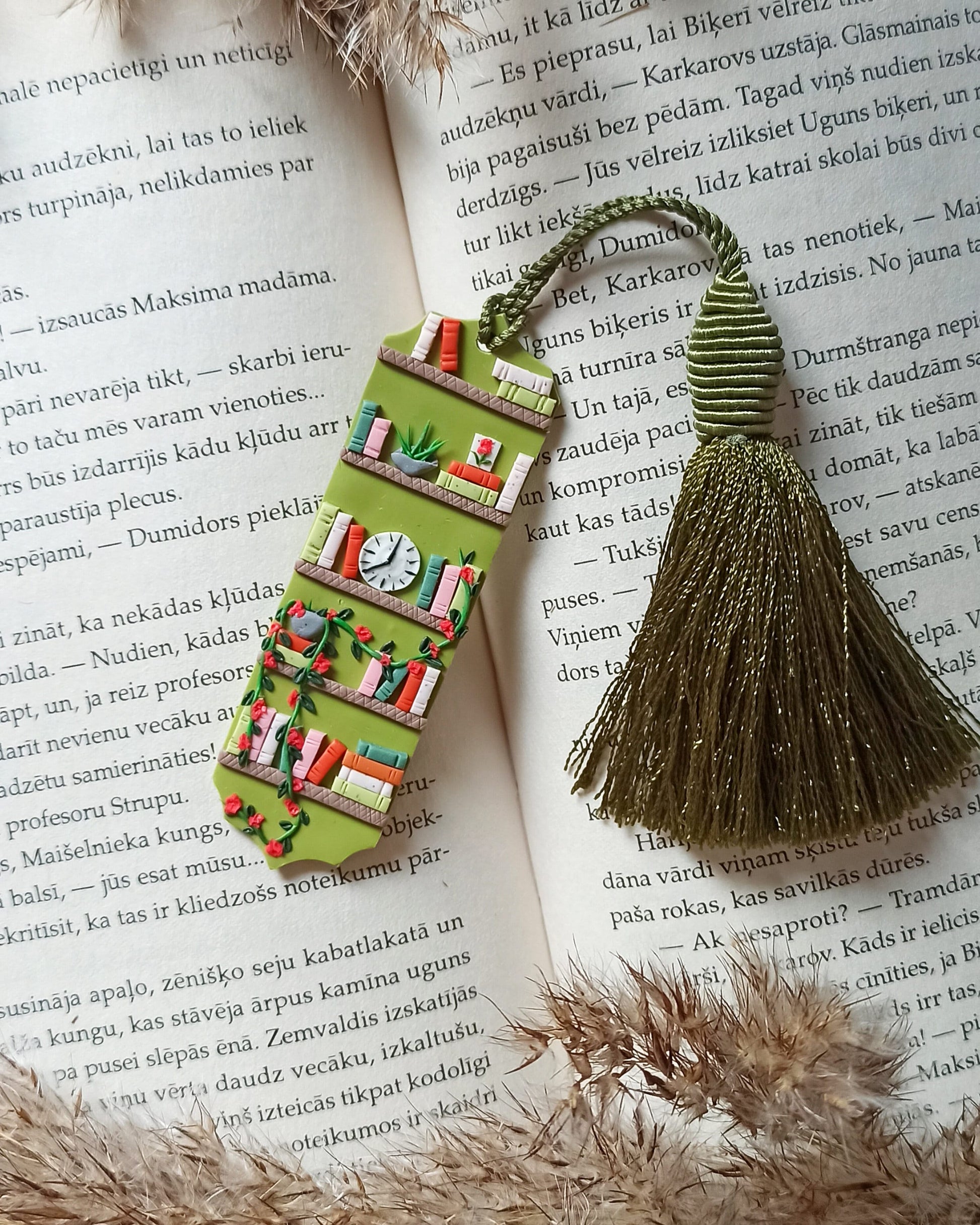Green tassel bookmark: Handmade polymer clay book mark with small books and plants