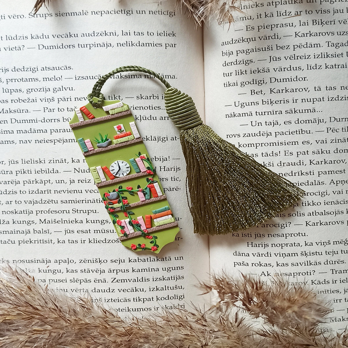 Green tassel bookmark: Handmade polymer clay book mark with small books and plants