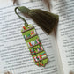 Green tassel bookmark: Handmade polymer clay book mark with small books and plants